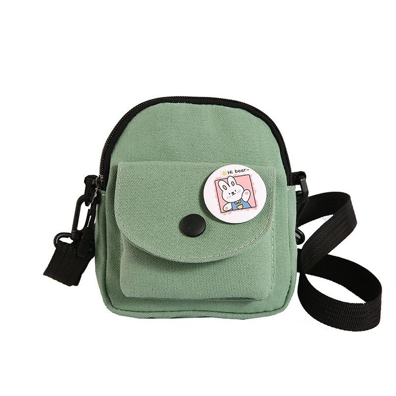 Platnena crossbody torba, gradski minimalistički stil, vertikalni kvadratni oblik, podstava od poliestera, zatvaranje na zip, proljeće 2024