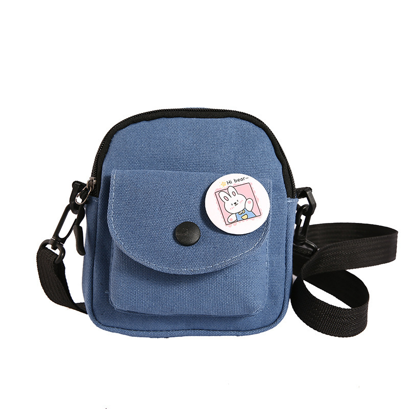 Platnena crossbody torba, gradski minimalistički stil, vertikalni kvadratni oblik, podstava od poliestera, zatvaranje na zip, proljeće 2024
