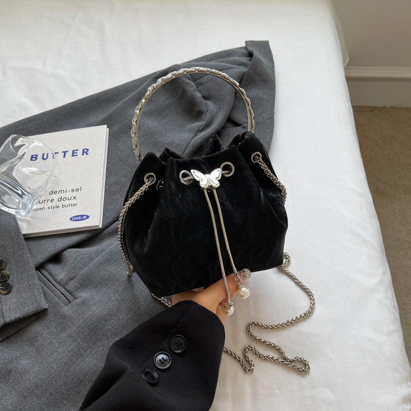 Ženska bucket crossbody torba, PU materijal, zatvaranje šniranjem, bucket oblik, unutarnji džep za telefon