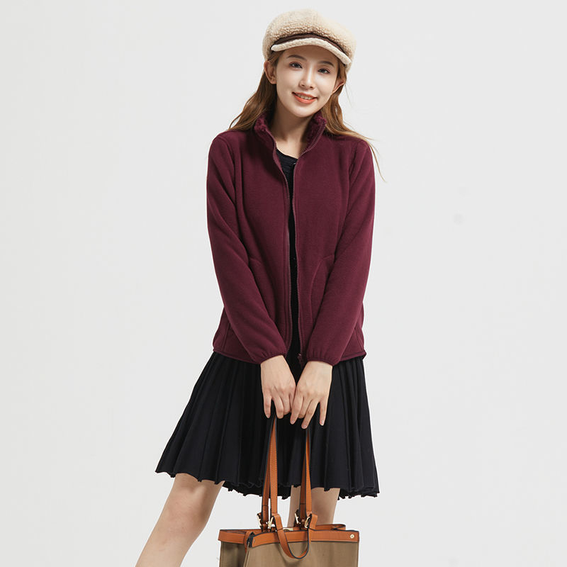 Uniszex téli kétoldalas fleece dzseki, szélvédett, szintetikus rostok keverékéből.