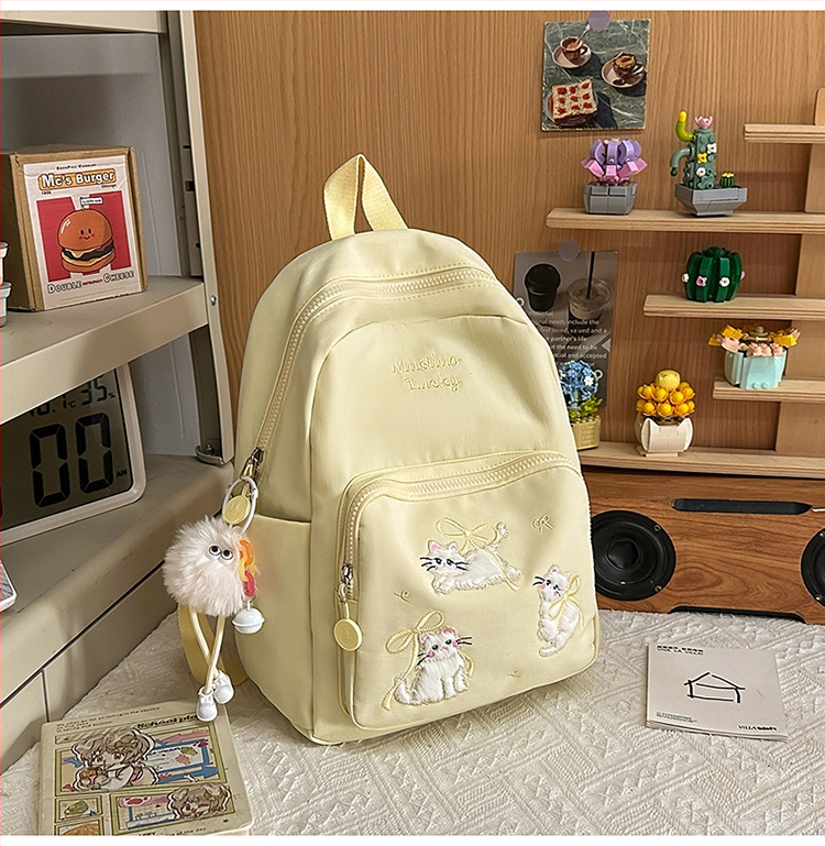 Rucsac din nylon cu motiv brodat de pisicuță, capacitate mare, extensibil cu protecție a coloanei și curele umerare curbate, pentru gimnaziu