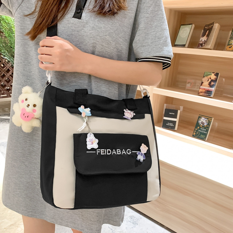 Unisex školský batoh z nylonu, objem 20–35 L, jednoduchý dizajn