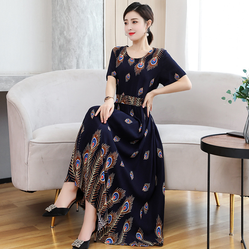 Šaty z viskózovej látky s kvetinovým vzorom, krátke rukávy, okrúhly výstrih, elastický pás, stredne dlhé, štýl princeznej.