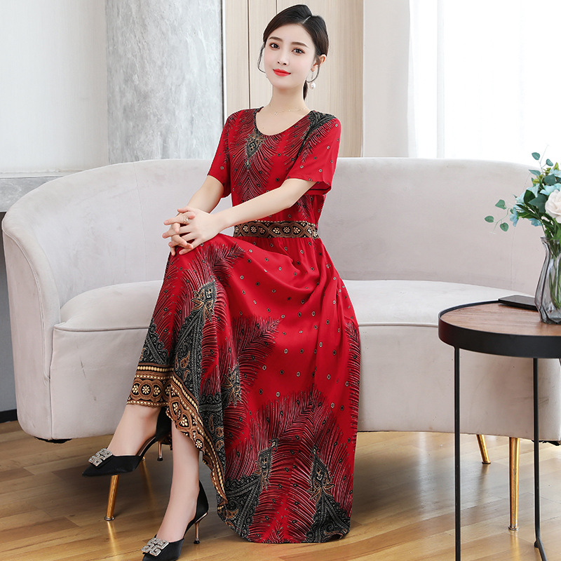 Šaty z viskózovej látky s kvetinovým vzorom, krátke rukávy, okrúhly výstrih, elastický pás, stredne dlhé, štýl princeznej.