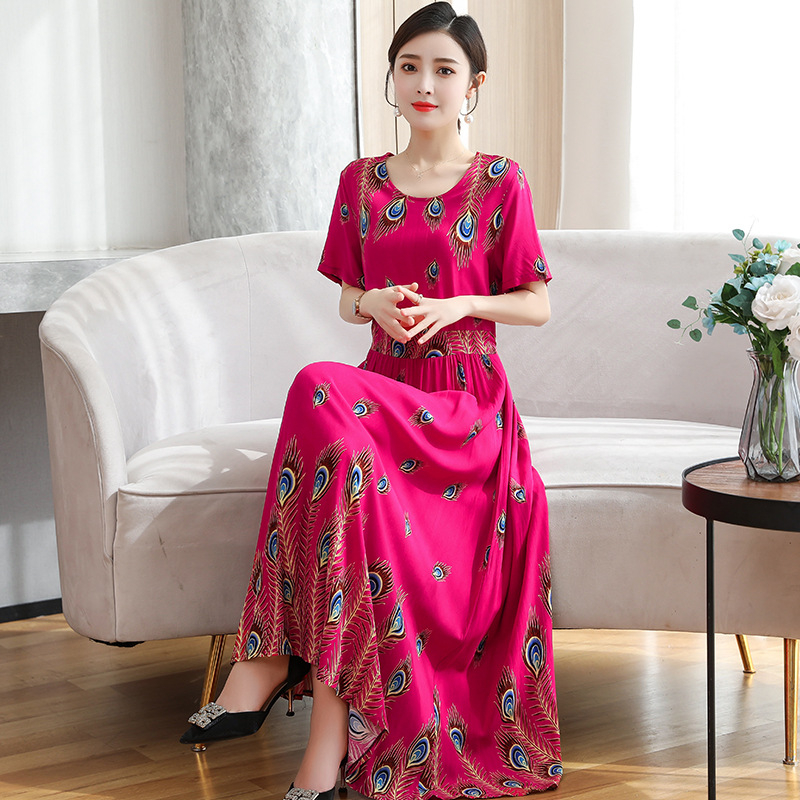 Šaty z viskózovej látky s kvetinovým vzorom, krátke rukávy, okrúhly výstrih, elastický pás, stredne dlhé, štýl princeznej.