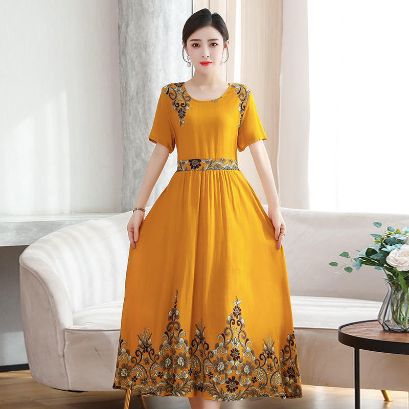 Šaty z viskózovej látky s kvetinovým vzorom, krátke rukávy, okrúhly výstrih, elastický pás, stredne dlhé, štýl princeznej.