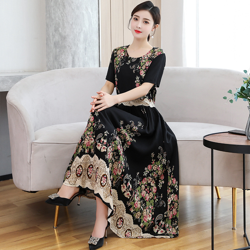 Šaty z viskózovej látky s kvetinovým vzorom, krátke rukávy, okrúhly výstrih, elastický pás, stredne dlhé, štýl princeznej.