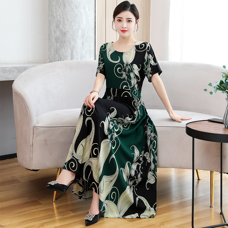 Šaty z viskózovej látky s kvetinovým vzorom, krátke rukávy, okrúhly výstrih, elastický pás, stredne dlhé, štýl princeznej.