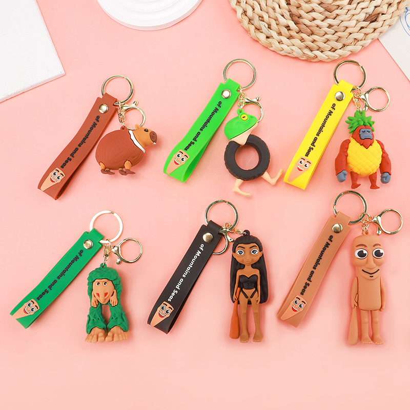 PVC kulcstartó – karikatúra figura Shanhaijing, ember bottal és cápa baba