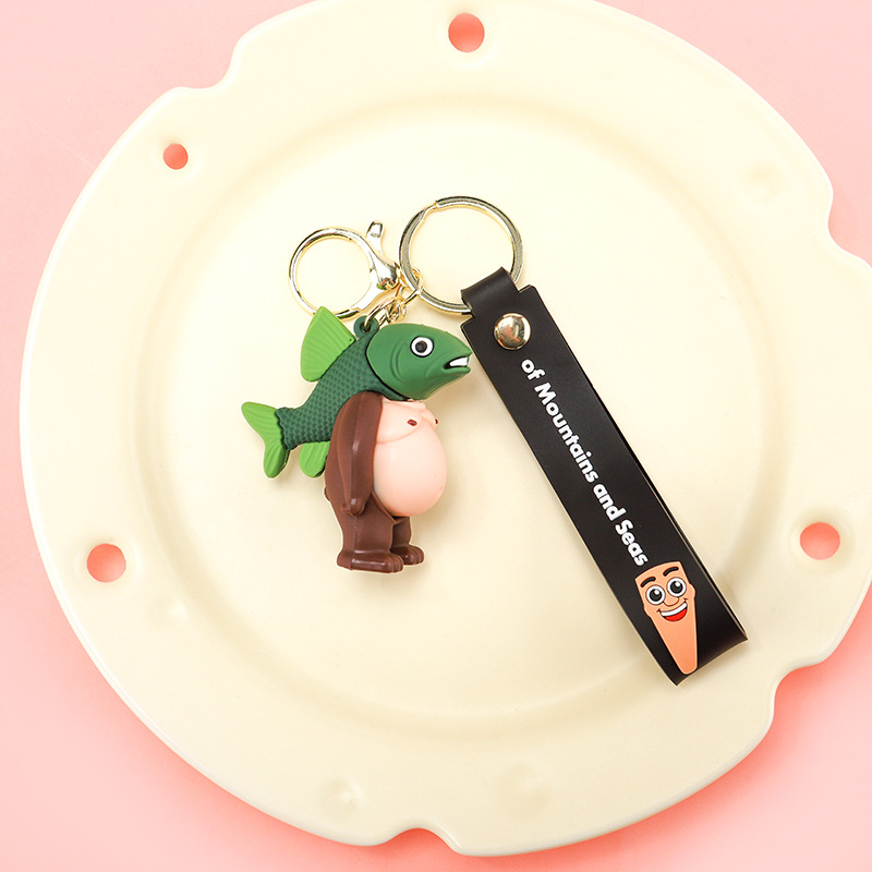 PVC kulcstartó – karikatúra figura Shanhaijing, ember bottal és cápa baba