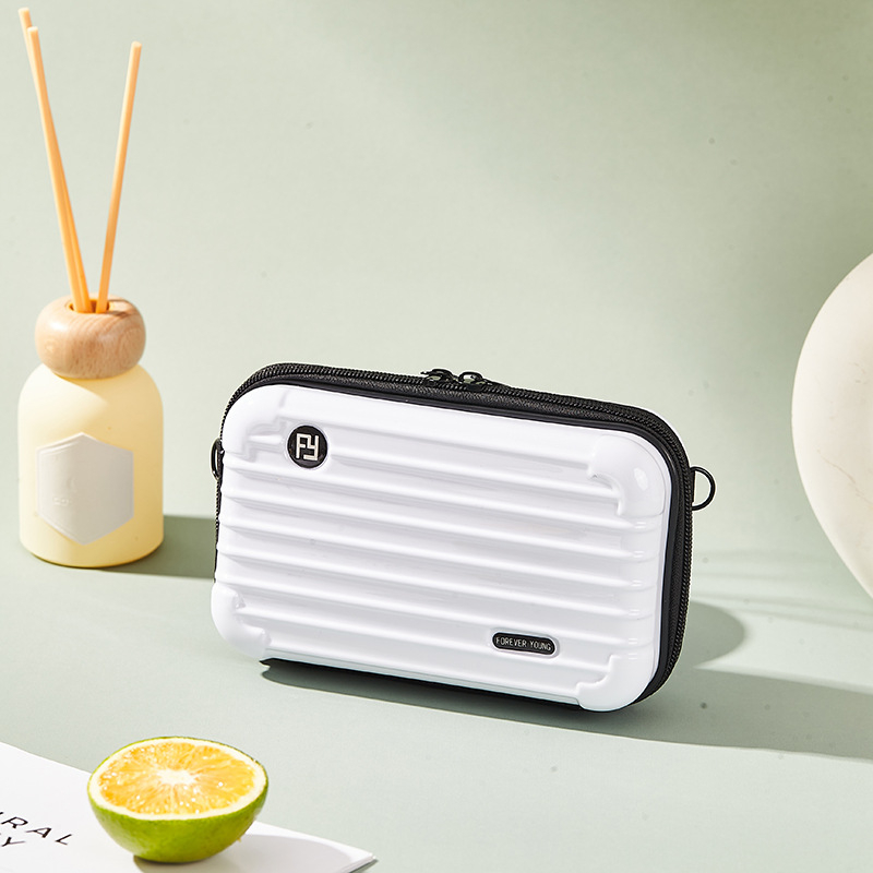 Mini PC kozmetička torbica s crossbody remenom, korejskog stila za putovanja; vanjska plastika, podstava od poliester; vodootporna, periva, višefunkcionalna; unisex.
