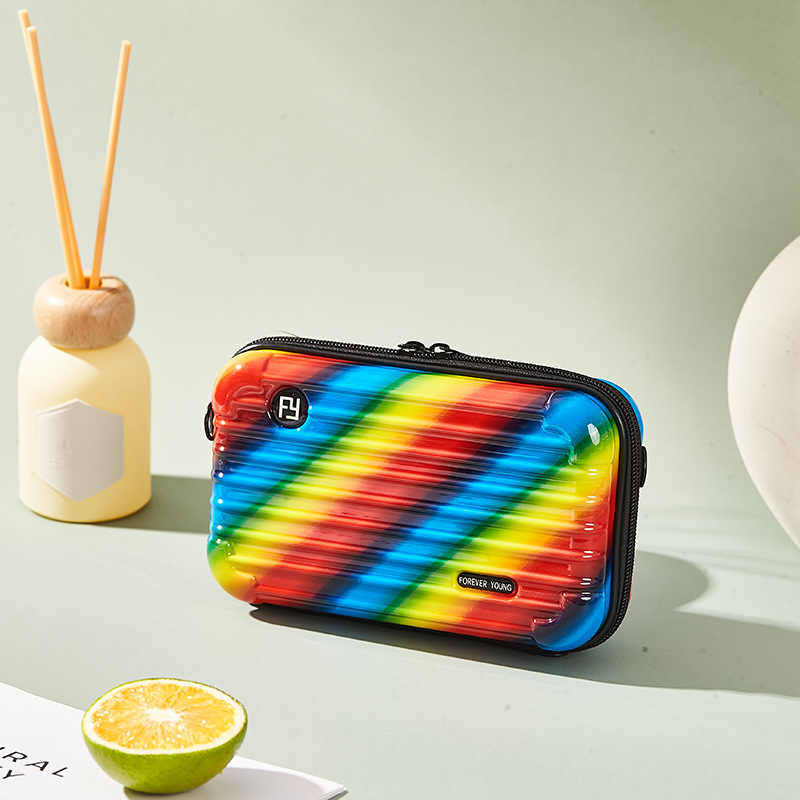 Mini PC kozmetička torbica s crossbody remenom, korejskog stila za putovanja; vanjska plastika, podstava od poliester; vodootporna, periva, višefunkcionalna; unisex.