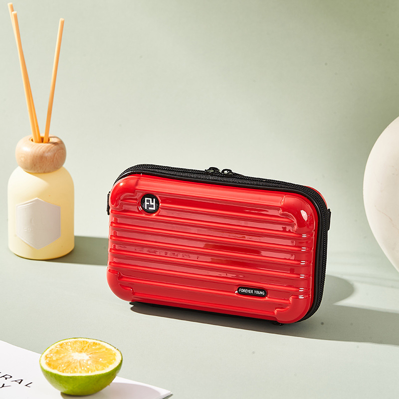 Mini PC kozmetička torbica s crossbody remenom, korejskog stila za putovanja; vanjska plastika, podstava od poliester; vodootporna, periva, višefunkcionalna; unisex.