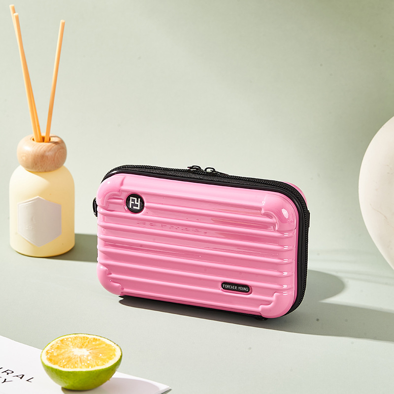 Mini PC kozmetička torbica s crossbody remenom, korejskog stila za putovanja; vanjska plastika, podstava od poliester; vodootporna, periva, višefunkcionalna; unisex.