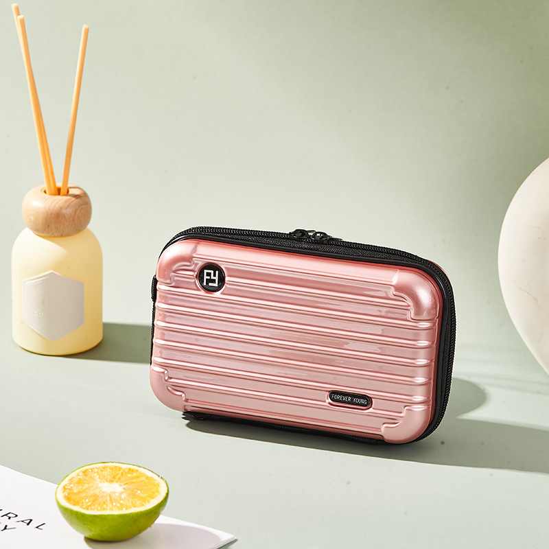 Mini PC kozmetička torbica s crossbody remenom, korejskog stila za putovanja; vanjska plastika, podstava od poliester; vodootporna, periva, višefunkcionalna; unisex.