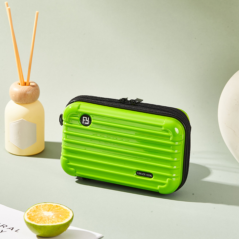 Mini PC kozmetička torbica s crossbody remenom, korejskog stila za putovanja; vanjska plastika, podstava od poliester; vodootporna, periva, višefunkcionalna; unisex.