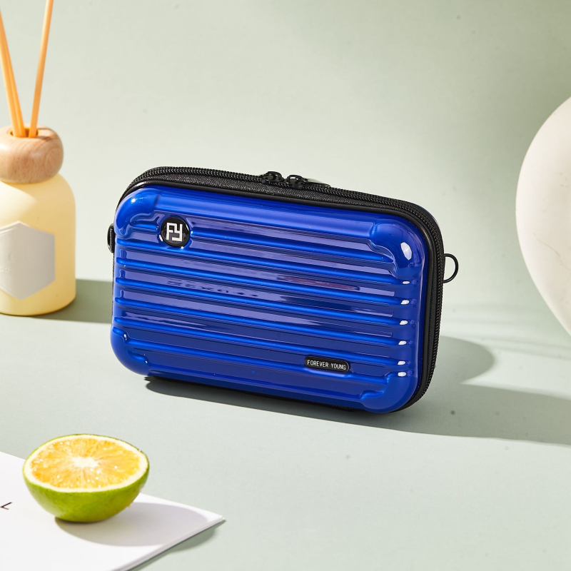 Mini PC kozmetička torbica s crossbody remenom, korejskog stila za putovanja; vanjska plastika, podstava od poliester; vodootporna, periva, višefunkcionalna; unisex.