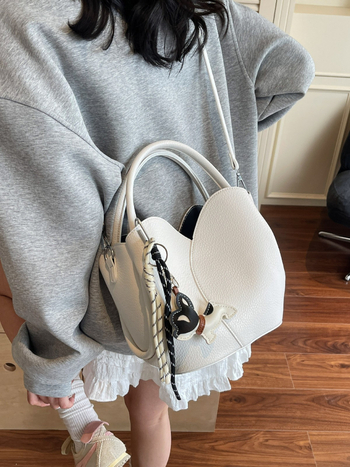 Geantă de damă tip bucket din PU, curea crossbody, închidere magnetică, căptușeală din piele sintetică, primăvara 2025