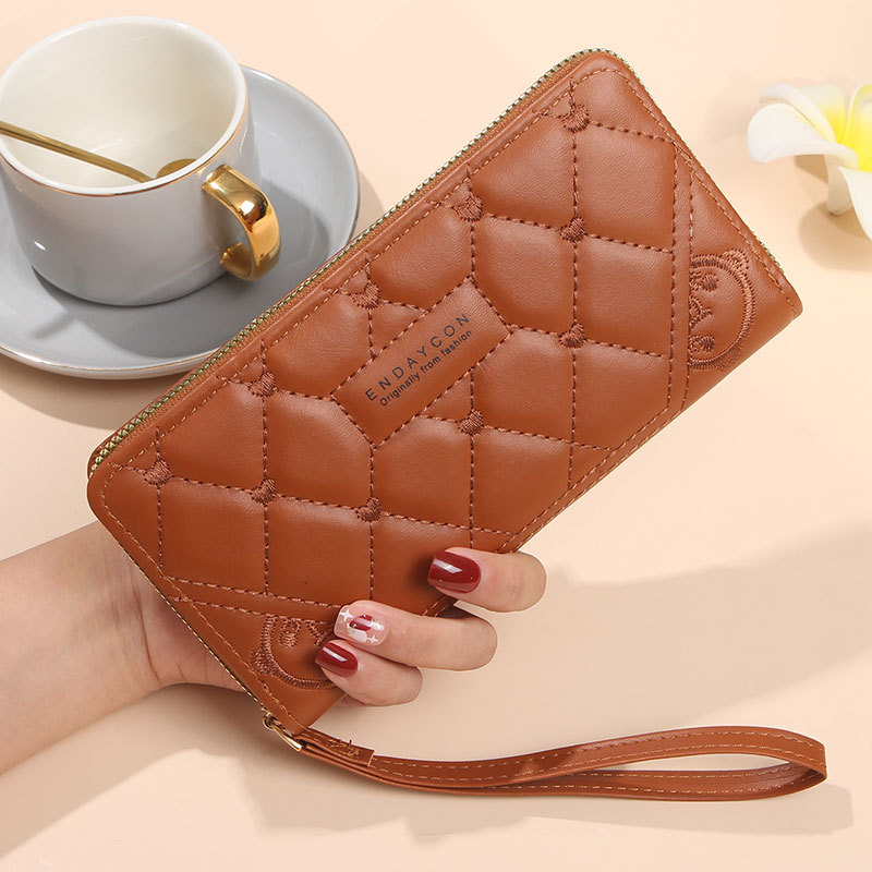Ženska clutch novčanik s dugim zatvaračem, višenamjenski i velika kapaciteta za telefon; PVC vanjština, unutrašnjost sintetička koža; jednobojni uzorak; izdanje 2025; pogodan za svakodnevnu upotrebu.