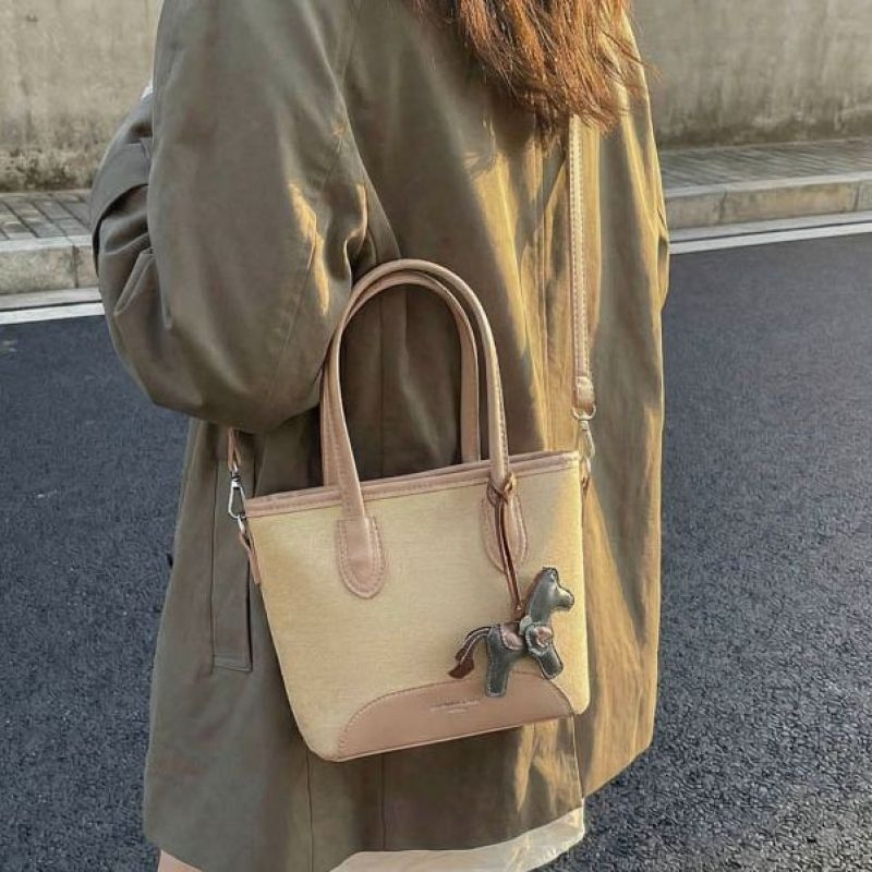 PU crossbody torba, model xinqi-6398, commuter stil, jedina naramenica, horizontalno pravokutnog oblika, zatvaranje zipom, podstava od poliestera, proljeće 2026