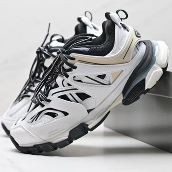 Unisex χαμηλά αθλητικά παπούτσια με επάνω συνθετικό δέρμα, στρογγυλή μύτη, κλείσιμο με κορδόνια, ύψος φτέρνας 3-5 εκ