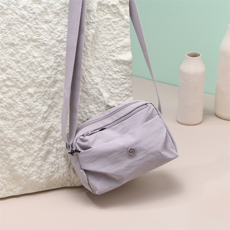 Jelanshi nylon torba preko ramena — vodoravni kvadratni oblik, zatvarač, poliester podstava, unutarnji džep