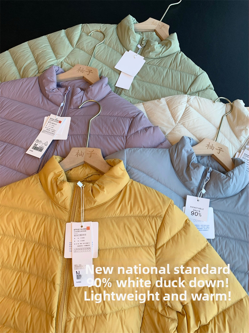 Tenká nylonová bunda s bielym kačacím páperím, obsah 85-90%, stojaci golier, zips