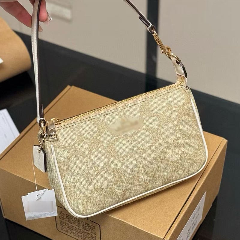 Nolita 19 Κλασική γυναικεία τσάντα καρπού με φερμουάρ — στυλ: αστικός μινιμαλισμός; υλικό: PVC; σχήμα: οριζόντιο τετράγωνο; άνοιγμα: φερμουάρ; εσωτερική δομή: επενδεδυμένος θάλαμος με φερμουάρ