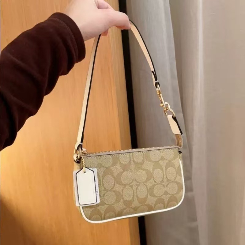 Nolita 19 Κλασική γυναικεία τσάντα καρπού με φερμουάρ — στυλ: αστικός μινιμαλισμός; υλικό: PVC; σχήμα: οριζόντιο τετράγωνο; άνοιγμα: φερμουάρ; εσωτερική δομή: επενδεδυμένος θάλαμος με φερμουάρ