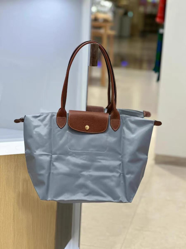 Τσάντα ώμου τύπου dumpling από Oxford ύφασμα, κλείσιμο με καπάκι, εσωτερικές θήκες για κινητό και έγγραφα, επένδυση πολυεστερική