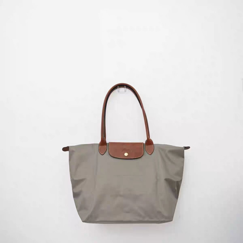 Τσάντα ώμου τύπου dumpling από Oxford ύφασμα, κλείσιμο με καπάκι, εσωτερικές θήκες για κινητό και έγγραφα, επένδυση πολυεστερική