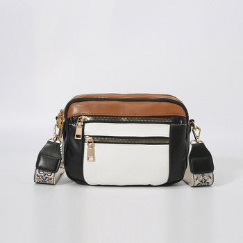 Ženska crossbody torba, kvadratnog oblika, PU materijal, zatvarač, poliester podstava, unutarnji džepovi: džep na zatvarač i džep za mobitel