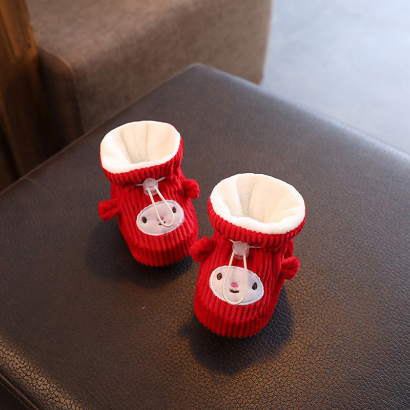 Téli babacipő corduroy felsőrésszel, karikatúra mintával, elasztikus zárással, 2–13 hónapos korosztálynak