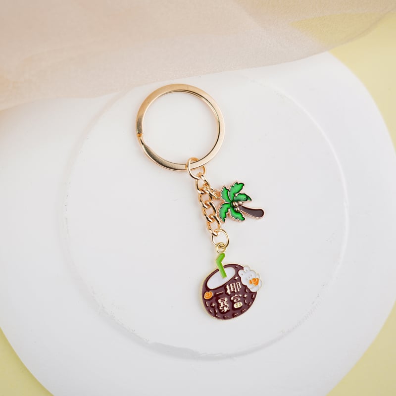 Fém kulcstartó medál – gyümölcs ihletésű szöveges dizájn és aranyos lányos karikatúra, táska kiegészítő, ajándék