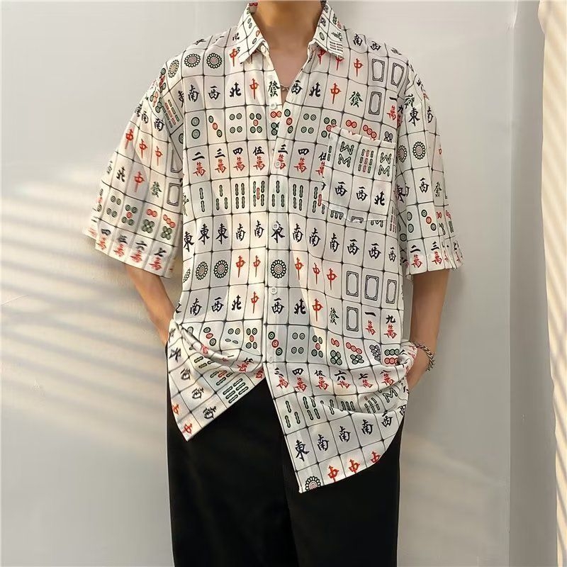 Cămașă cu imprimeu floral, guler pătrat, mâneci scurte, croială lejeră, poliester.