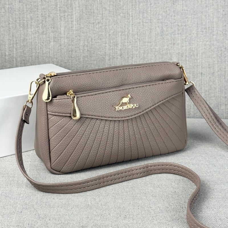 Τσάντα crossbody μίνι από PU δέρμα, οριζόντιου τετράγωνου σχήματος, φερμουάρ ανοίγματος, εσωτερική θήκη για κινητό και λαμιναρισμένη θήκη με φερμουάρ, μία ιμάντας, βαμβατένια επένδυση, αστικός μινιμαλισμός