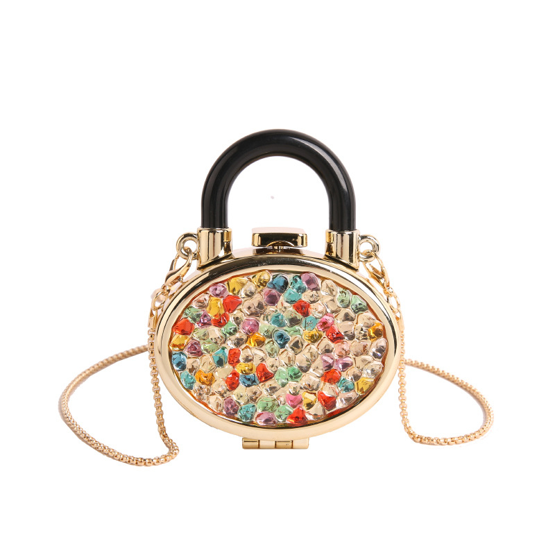 Ακρυλική χιαστί τσάντα, κυκλικό σχήμα, αστικός μινιμαλισμός, κλείσιμο με κλειδαριά, μονοϊμάντας