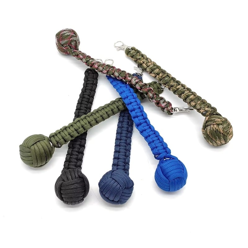 Топка за самозащита от плетено въже за открито, кръгъл ключодържател с форма на маймунски юмрук, седемжилен паракорд, стоманена топка за самозащита при оцеляване в планинарство, черна.