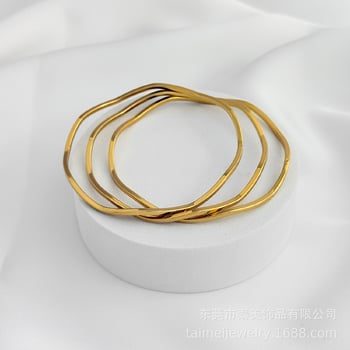 Трансгранична горещо продавана усукана гривна от неръждаема стомана с квадратна тел, бижута с вълнообразна титаниева стомана, сферични бижута