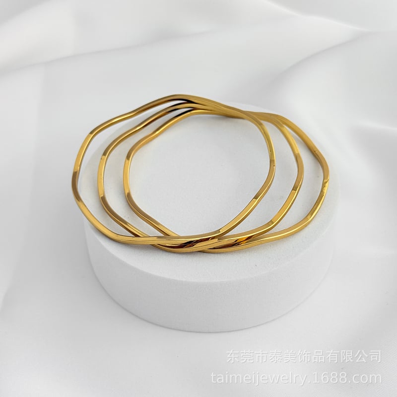 Трансгранична горещо продавана усукана гривна от неръждаема стомана с квадратна тел, бижута с вълнообразна титаниева стомана, сферични бижута