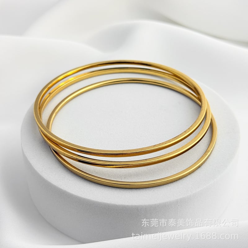 Трансгранична горещо продавана усукана гривна от неръждаема стомана с квадратна тел, бижута с вълнообразна титаниева стомана, сферични бижута