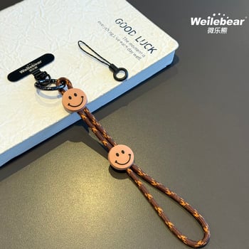 Koniec šmýkaniu! Šnúrka na telefón s usmievavou tváričkou, nastaviteľný remienok na zápästie, unisex prívesok na fotoaparát, šnúrka proti strate na vonkajšie použitie.