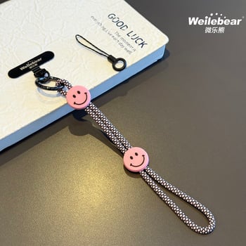 Koniec šmýkaniu! Šnúrka na telefón s usmievavou tváričkou, nastaviteľný remienok na zápästie, unisex prívesok na fotoaparát, šnúrka proti strate na vonkajšie použitie.