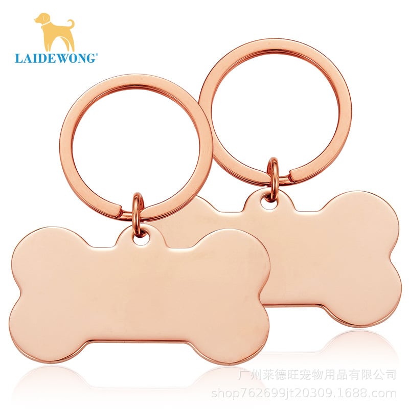 Rozsdamentes acélból készült azonosító biléták macskáknak és kutyáknak, lézergravírozással és logóval, hogy megakadályozzák az elvesztését.