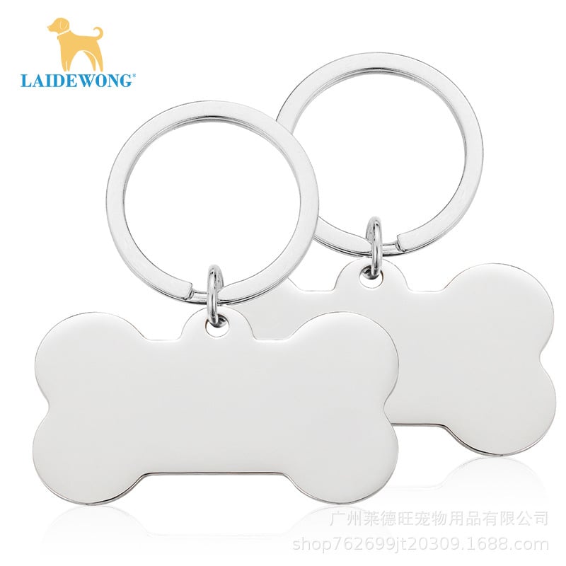 Rozsdamentes acélból készült azonosító biléták macskáknak és kutyáknak, lézergravírozással és logóval, hogy megakadályozzák az elvesztését.