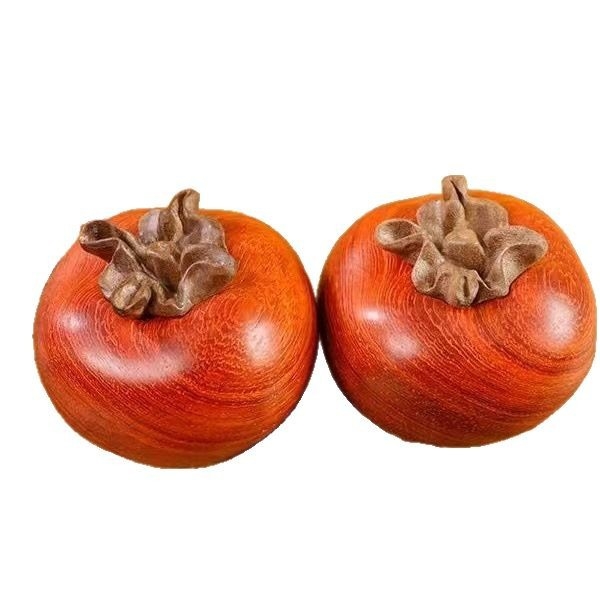 Дърворезба от rosewood — декоративна фигура на плод persimmon