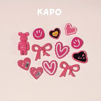 Crocs аксесоари: копчета за обувки с мече, сърце и панделка в розово и тъмно розово