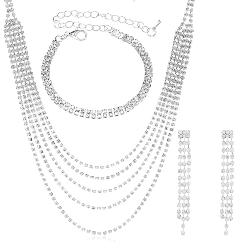 Set nakita s rhinestones: dugački lančić s resicama, naušnice i narukvica u srebrnoj boji