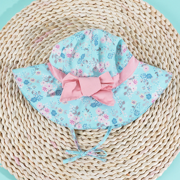 Dječja sunčana fisherman's kapa s floralnim uzorkom i mašnicom, kupolasti vrh, široki obod, poliester.
