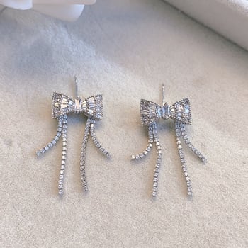 Öko-barátságos masni és bojt fülbevalók rézből és cirkóniummal, rövid fazon, elegáns nőknek